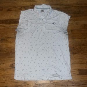 Medium Puma white polo with grey feather pattern.